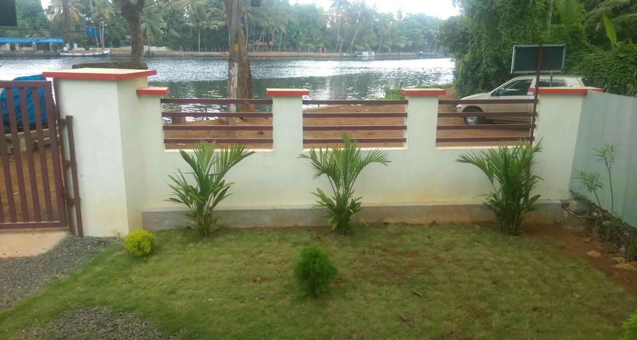Punerjeni Homes Alappuzha Exterior photo